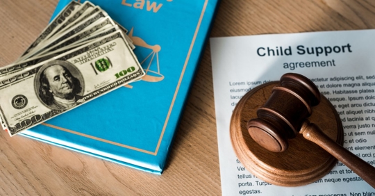 family law book with child support paperwork